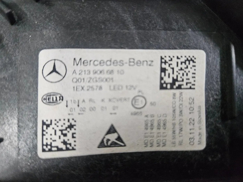 This image displays the right-side Multibeam LED headlight for the Mercedes-Benz E-Class W213 Facelift model, featuring OEM genuine quality with part number A2139066810. The headlight is an original Mercedes component, designed specifically for the facelifted W213 E-Class, offering advanced Multibeam LED lighting technology for superior road visibility and performance. This is a used but authentic part, ensuring compatibility and reliability.