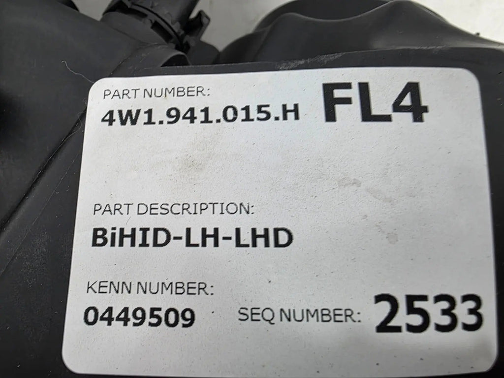 This image shows the left-side headlight for the 2014β2019 Bentley Flying Spur, featuring OEM genuine quality with part number 4W1941015H. This used original headlamp is in excellent condition, offering premium illumination, elegant design, and a precise fit for Bentleyβs high-end luxury sedan