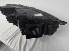 Load image into Gallery viewer, This image features the left-side Xenon headlight for the Volvo XC90, showcasing OEM genuine quality with part number 32404715. This used original headlamp is designed for accurate fitment and delivers powerful Xenon illumination, ensuring optimal visibility, durability, and premium performance for the XC90 luxury SUV