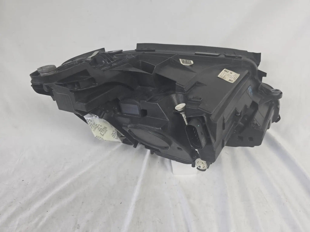 This image displays the left-side Multibeam LED headlight with blue accents for the Mercedes-Benz E-Class W213, featuring OEM genuine quality and part number A2139066504. This original used headlamp is designed for precise fitment on the W213 model, offering advanced Multibeam LED technology with distinctive blue detailing for high-performance adaptive illumination and premium styling