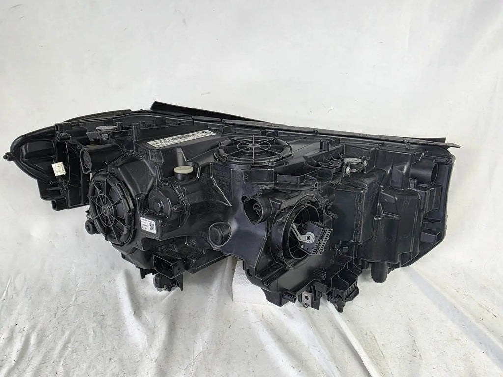 This image shows the left-side Adaptive LED headlight (ICON design) for the BMW 6 Series GT G32 model, featuring OEM genuine quality with part number 7496443. This used original headlamp is designed to deliver advanced Adaptive LED lighting with BMW’s ICON styling, offering precise fitment, enhanced road illumination, and premium performance for the 6 Series Gran Turismo.