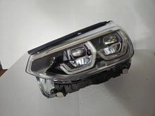 Load image into Gallery viewer, This image shows the left-side ICON Adaptive LED headlight for BMW models iX3 G08, X3 G01, X3 M F97, X4 G02, and X4 M F98, featuring OEM genuine quality with part number 7466119. This used original headlamp is designed to deliver BMW’s signature Adaptive LED lighting with ICON styling, ensuring precise fitment, enhanced visibility, and modern aesthetics for these high-performance models.