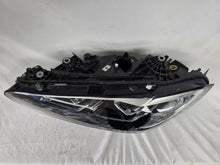 Load image into Gallery viewer, Used genuine BMW LED headlight for 4 Series models including G22, G23, G26, G80, G82, and G83. This left-side OEM headlamp, part number 9851035, is designed to perfectly fit and function in compatible BMW vehicles. The image shows the original BMW LED headlight in used condition with visible connectors, housing, and lens – ideal for replacement or repair of your vehicle’s front lighting system.