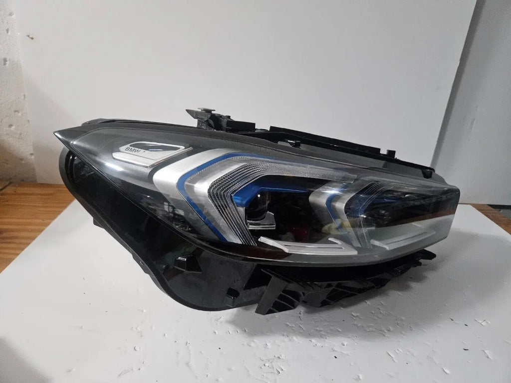 This image features the right-side Adaptive LED headlight for the BMW 3 Series G20 LCI and G21 LCI models, with OEM genuine quality and part number 5A1A354. This used original headlamp is designed for the facelifted versions, offering precise fitment, dynamic beam control, and advanced Adaptive LED technology to enhance visibility and maintain the sleek, modern appearance of the 3 Series.