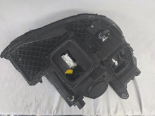 Load image into Gallery viewer, This image displays the left-side Multibeam LED headlight with blue accents for the Mercedes-Benz E-Class W213, featuring OEM genuine quality and part number A2139066504. This original used headlamp is designed for precise fitment on the W213 model, offering advanced Multibeam LED technology with distinctive blue detailing for high-performance adaptive illumination and premium styling