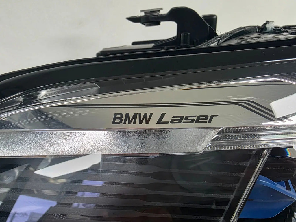 This image displays the right-side Laser headlight for BMW models X5 G05, X5 M F95, X6 G06, and X6 M F96, featuring OEM genuine quality with part number 5A27998. This used original headlamp delivers cutting-edge BMW Laserlight technology, offering enhanced night visibility, precise fitment, and a sleek, high-performance design tailored for these luxury SUV models.