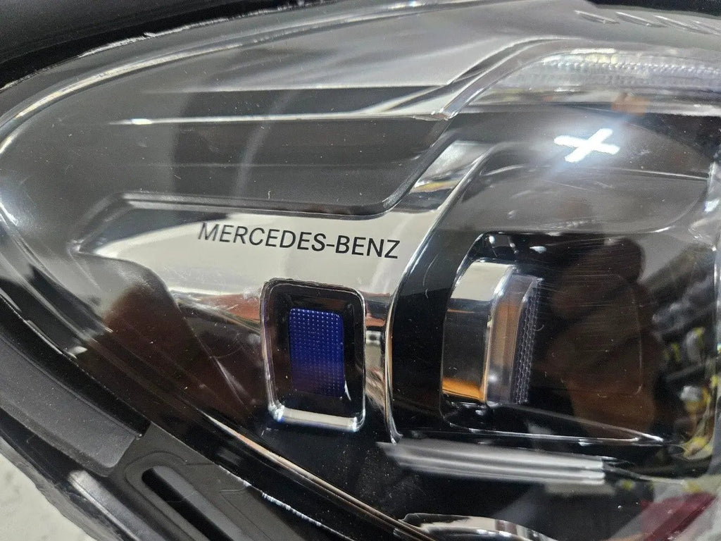 This image displays the right-side Multibeam LED headlight for the Mercedes-Benz E-Class W213 Facelift model, featuring OEM genuine quality with part number A2139066810. The headlight is an original Mercedes component, designed specifically for the facelifted W213 E-Class, offering advanced Multibeam LED lighting technology for superior road visibility and performance. This is a used but authentic part, ensuring compatibility and reliability.
