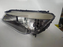 Load image into Gallery viewer, This image features the left-side Xenon headlight for the BMW 7 Series F01/F02 models, showcasing used OEM genuine quality with part number 7225229. Designed specifically for the F01 and F02 chassis, this original headlamp offers high-intensity Xenon lighting and precise fitment for the left side, ensuring reliable performance and compatibility.