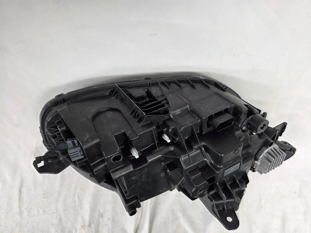 This image features the left-side Xenon headlight for the Volvo XC90, showcasing OEM genuine quality with part number 32404715. This used original headlamp is designed for accurate fitment and delivers powerful Xenon illumination, ensuring optimal visibility, durability, and premium performance for the XC90 luxury SUV