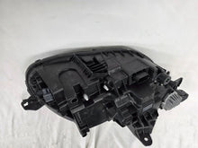 Load image into Gallery viewer, This image features the left-side Xenon headlight for the Volvo XC90, showcasing OEM genuine quality with part number 32404715. This used original headlamp is designed for accurate fitment and delivers powerful Xenon illumination, ensuring optimal visibility, durability, and premium performance for the XC90 luxury SUV