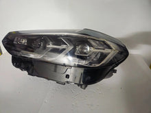 Load image into Gallery viewer, This image features the left-side Adaptive LED headlight for BMW models including iX3 G08, X3 G01, X3 M F97, X4 G02, and X4 M F98, with OEM genuine quality and part number 5A29203. This used original headlamp provides precise fitment and BMW’s advanced Adaptive LED technology, ensuring enhanced visibility, dynamic beam control, and premium styling for these performance SUVs.
