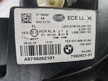 Load image into Gallery viewer, This image features the left-side LED headlight for the BMW 1 Series F20 and F21 LCI (facelift) models, with OEM genuine quality and part number 7492621. This used original headlamp is designed specifically for the facelifted versions, offering sharp LED illumination, precise fitment, and the premium build quality expected from BMW OEM components
