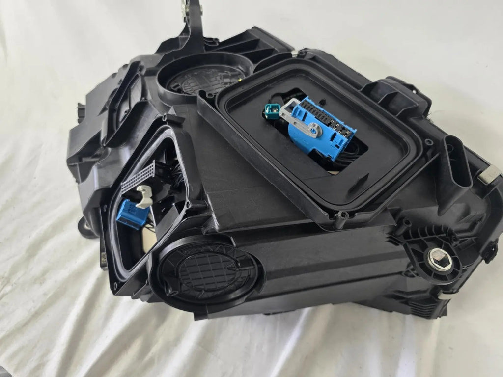 This image features the right-side DIGITAL LIGHT headlight for the Mercedes-Benz E-Class W214, with OEM genuine quality and part number A2149066202. Specifically designed for the W214 model, this used original headlamp incorporates Mercedes-Benz's advanced DIGITAL LIGHT technology, delivering adaptive high-precision illumination and a perfect factory fit on the right side.