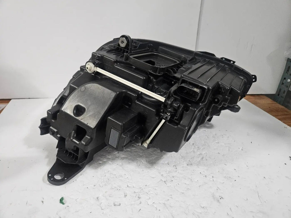 This image features the right-side LED High Performance headlight for the Mercedes-Benz E-Class W213, showcasing OEM genuine quality with part number A2139064004. Specifically designed for the W213 model, this used headlight offers high-performance LED illumination and is an original Mercedes-Benz component, ensuring precise fit and reliable functionality