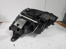 Load image into Gallery viewer, This image features the right-side LED High Performance headlight for the Mercedes-Benz E-Class W213, showcasing OEM genuine quality with part number A2139064004. Specifically designed for the W213 model, this used headlight offers high-performance LED illumination and is an original Mercedes-Benz component, ensuring precise fit and reliable functionality