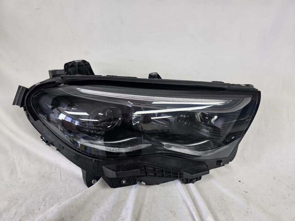 This image features the right-side DIGITAL LIGHT headlight for the Mercedes-Benz E-Class W214, with OEM genuine quality and part number A2149066202. Specifically designed for the W214 model, this used original headlamp incorporates Mercedes-Benz's advanced DIGITAL LIGHT technology, delivering adaptive high-precision illumination and a perfect factory fit on the right side.