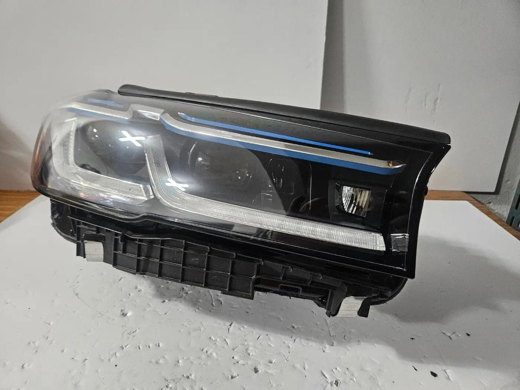 This image displays the right-side Laser headlight for BMW 5 Series G30, G31, and F90 LCI models, featuring OEM genuine quality with part number 9850588. This used original headlamp is designed for a precise fit on the facelifted (LCI) versions of the 5 Series, delivering advanced BMW Laserlight technology for superior visibility, performance, and modern styling