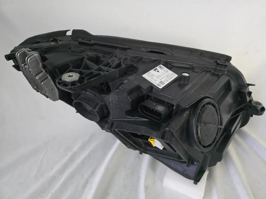 This image features the left-side Multibeam LED headlight for the Mercedes-Benz C-Class W205 Facelift (FL) model, with OEM genuine quality and part number A2059061506. This used original headlamp is designed for a perfect fit on the facelifted W205, delivering advanced Multibeam LED technology for precise, adaptive lighting and optimal driving visibility