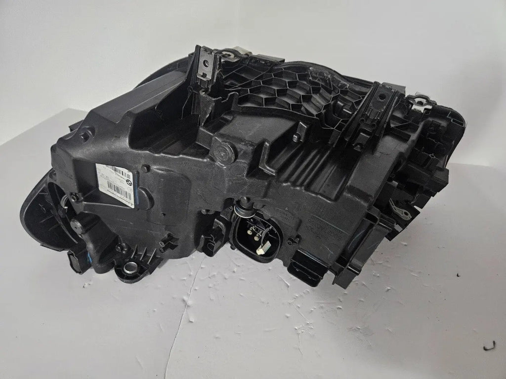 This image displays the right-side ICON Adaptive LED headlight for BMW models iX3 G08, X3 G01, X3 M F97, X4 G02, and X4 M F98, featuring OEM genuine quality with part number 7494052. This used original headlamp offers BMW’s advanced Adaptive LED with ICON design, delivering precise light distribution, dynamic styling, and perfect fitment for these specific models