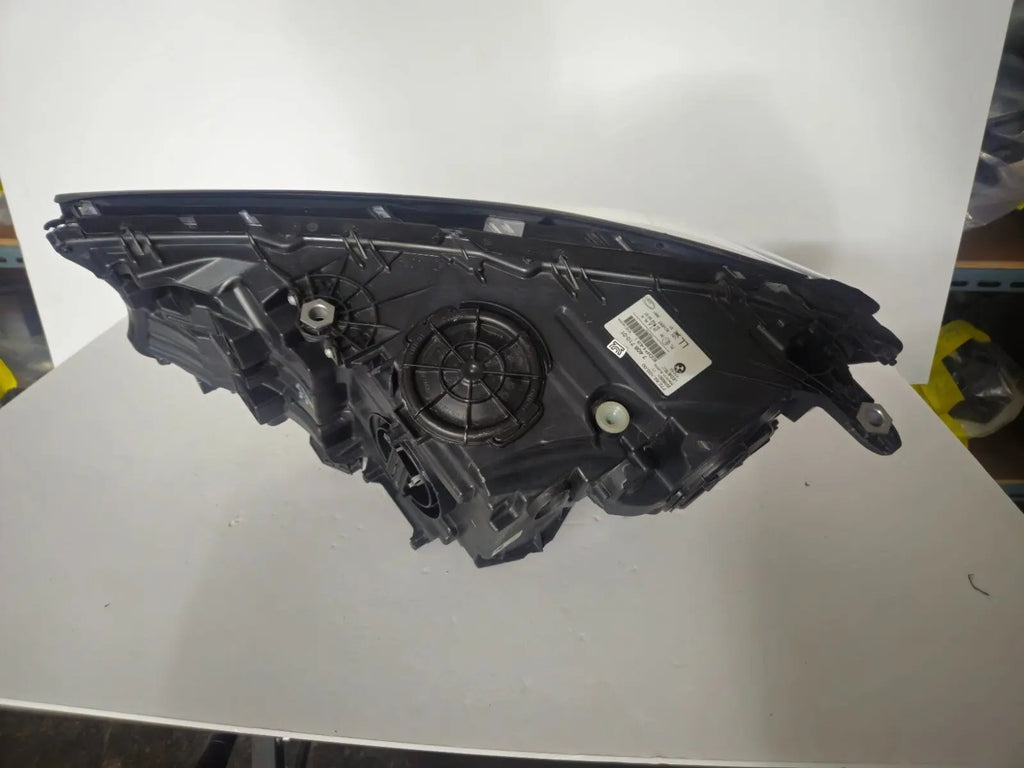 This image features the right-side Adaptive LED headlight (ICON design) for the BMW 7 Series G11 and G12 models, showcasing OEM genuine quality with part number 7408710. This used original headlamp offers BMW’s signature Adaptive LED with ICON styling, providing dynamic lighting performance, precise fitment, and premium functionality tailored for the luxury 7 Series lineup.