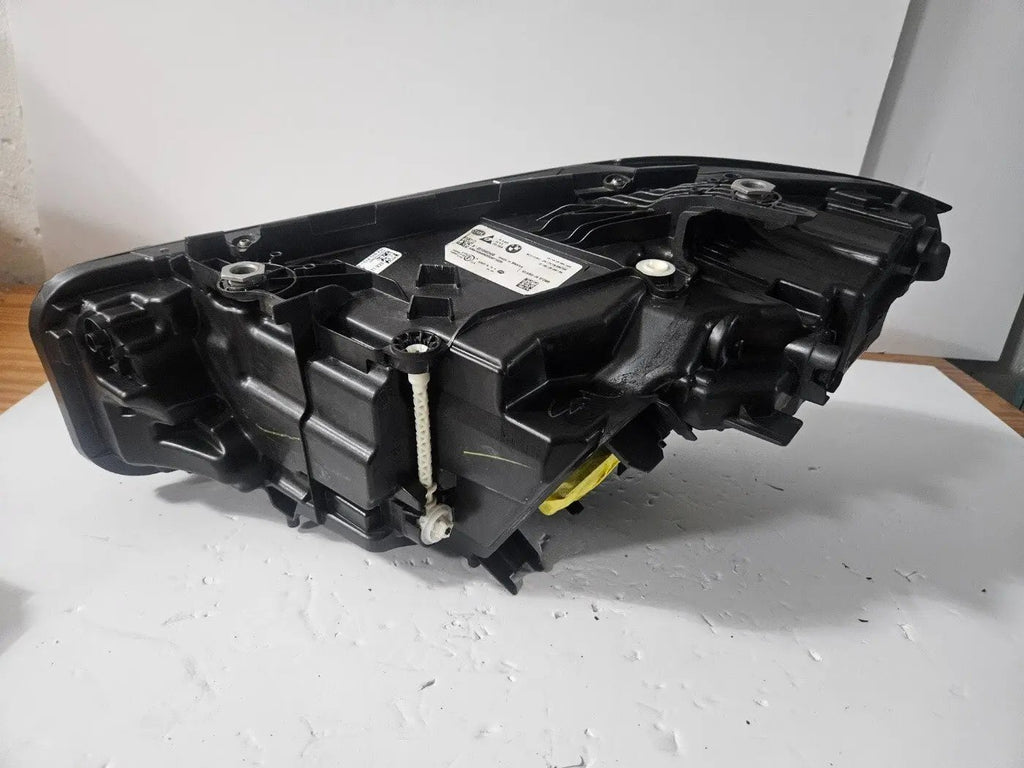 This image features the right-side Adaptive LED headlight for the BMW 3 Series G20 LCI and G21 LCI models, with OEM genuine quality and part number 5A1A354. This used original headlamp is designed for the facelifted versions, offering precise fitment, dynamic beam control, and advanced Adaptive LED technology to enhance visibility and maintain the sleek, modern appearance of the 3 Series.