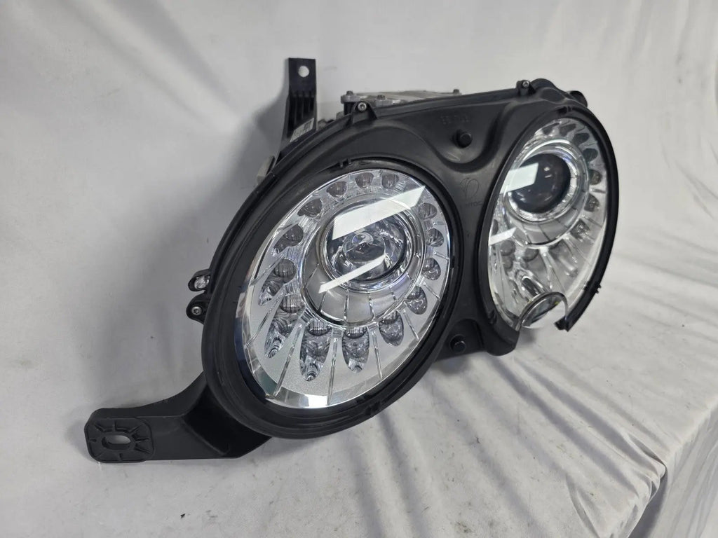 This image shows the left-side headlight for the 2014β2019 Bentley Flying Spur, featuring OEM genuine quality with part number 4W1941015H. This used original headlamp is in excellent condition, offering premium illumination, elegant design, and a precise fit for Bentleyβs high-end luxury sedan