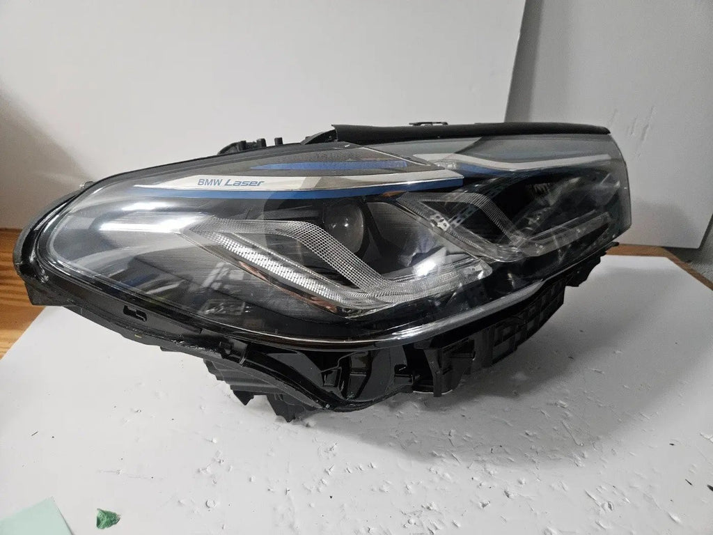This image displays the right-side Laser headlight for BMW 5 Series G30, G31, and F90 LCI models, featuring OEM genuine quality with part number 9850588. This used original headlamp is designed for a precise fit on the facelifted (LCI) versions of the 5 Series, delivering advanced BMW Laserlight technology for superior visibility, performance, and modern styling