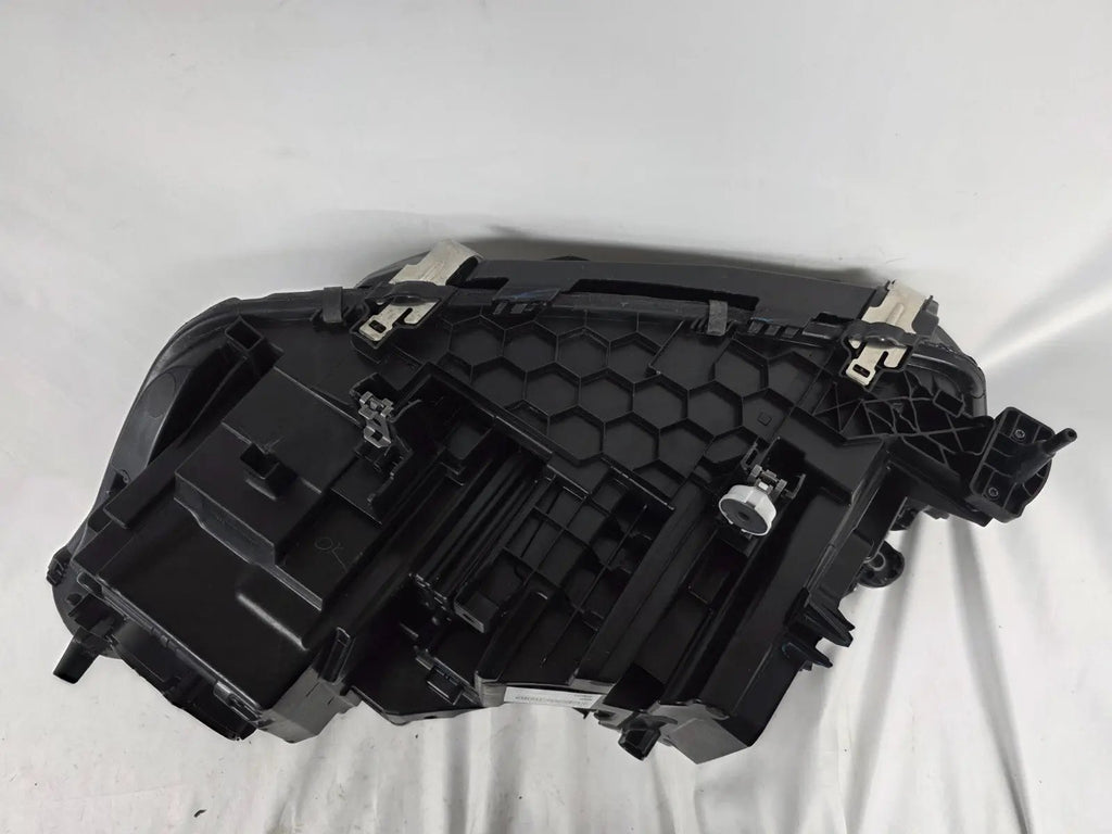 This image displays the right-side Laser headlight for BMW models X5 G05, X5 M F95, X6 G06, and X6 M F96, featuring OEM genuine quality with part number 5A27998. This used original headlamp delivers cutting-edge BMW Laserlight technology, offering enhanced night visibility, precise fitment, and a sleek, high-performance design tailored for these luxury SUV models.