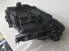 Load image into Gallery viewer, Genuine OEM Adaptive LED headlight for BMW iX3 and compatible models including G08, G01, F97, G02, and F98 with LCI (facelift) updates. This right-side headlamp, part number 5A29204, features adaptive lighting technology for enhanced road illumination and driving safety. The image showcases the original right LED headlight in used condition, clearly showing the lens, housing, and connector points — perfect for replacement on BMW iX3 and related LCI models.