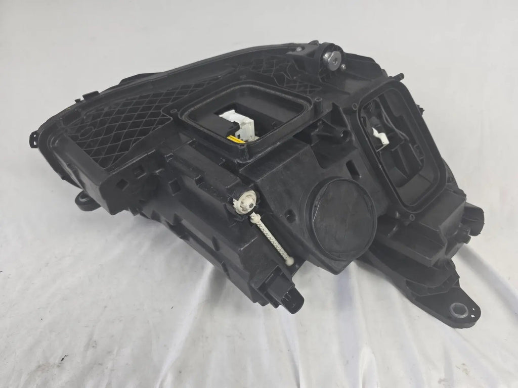 This image displays the left-side Multibeam LED headlight with blue accents for the Mercedes-Benz E-Class W213, featuring OEM genuine quality and part number A2139066504. This original used headlamp is designed for precise fitment on the W213 model, offering advanced Multibeam LED technology with distinctive blue detailing for high-performance adaptive illumination and premium styling