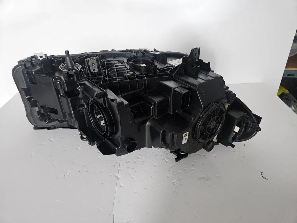 This image shows the left-side Adaptive LED ICON headlight for the BMW 5 Series G30, G31, G38, and F90 LCI models, featuring OEM genuine quality with part number 8499121. This used original headlamp is designed for the facelifted (LCI) versions of these models, offering BMW’s signature Adaptive LED ICON lighting technology for enhanced visibility, precise beam control, and a sleek, modern design.