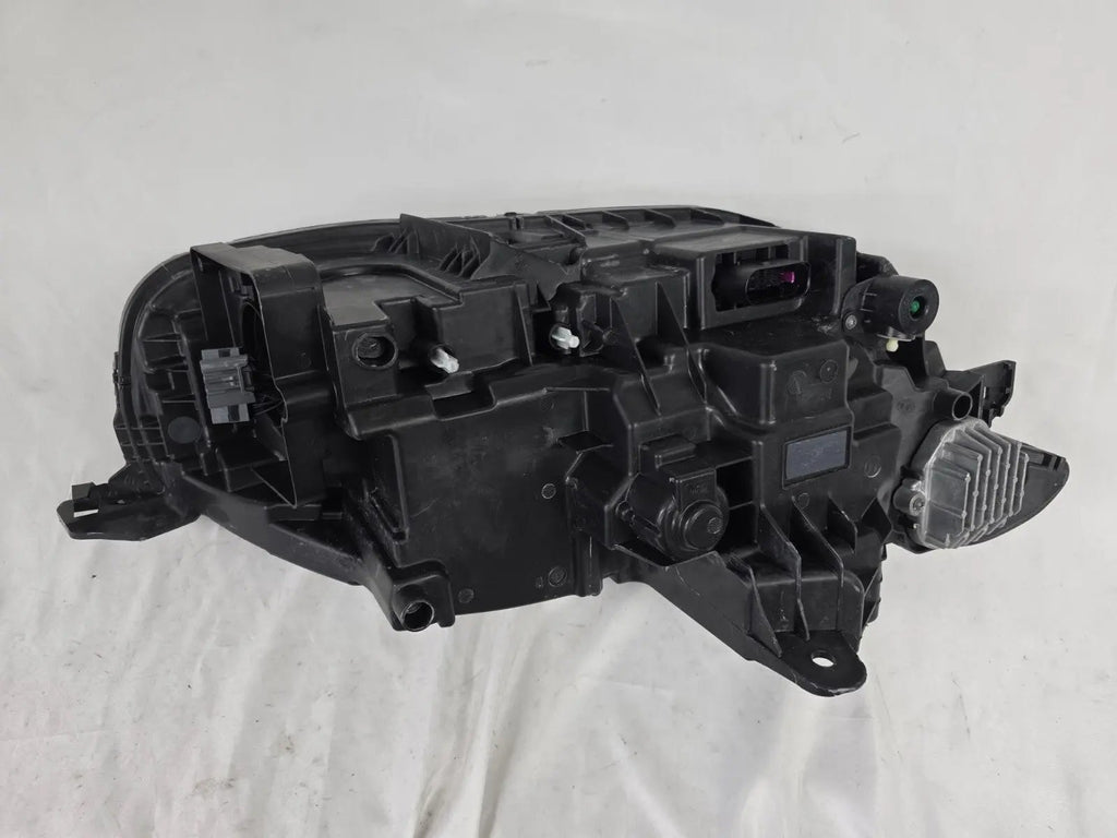 This image features the left-side Xenon headlight for the Volvo XC90, showcasing OEM genuine quality with part number 32404715. This used original headlamp is designed for accurate fitment and delivers powerful Xenon illumination, ensuring optimal visibility, durability, and premium performance for the XC90 luxury SUV