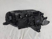 Load image into Gallery viewer, This image features the left-side Xenon headlight for the Volvo XC90, showcasing OEM genuine quality with part number 32404715. This used original headlamp is designed for accurate fitment and delivers powerful Xenon illumination, ensuring optimal visibility, durability, and premium performance for the XC90 luxury SUV