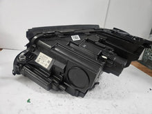 Load image into Gallery viewer, This image features the right-side LED High Performance headlight for the Mercedes-Benz E-Class W213, showcasing OEM genuine quality with part number A2139064004. Specifically designed for the W213 model, this used headlight offers high-performance LED illumination and is an original Mercedes-Benz component, ensuring precise fit and reliable functionality