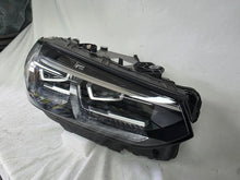 Load image into Gallery viewer, Genuine OEM Adaptive LED headlight for BMW iX3 and compatible models including G08, G01, F97, G02, and F98 with LCI (facelift) updates. This right-side headlamp, part number 5A29204, features adaptive lighting technology for enhanced road illumination and driving safety. The image showcases the original right LED headlight in used condition, clearly showing the lens, housing, and connector points — perfect for replacement on BMW iX3 and related LCI models.