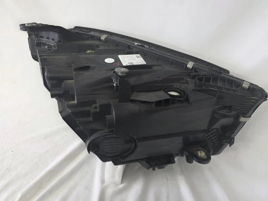 This image shows the left-side DIGITAL LIGHT headlight for the Mercedes-Benz E-Class W214, featuring OEM genuine quality with part number A2149066102. Designed for a precise fit on the left side of the W214 model, this used original headlamp offers Mercedes-Benz’s advanced DIGITAL LIGHT technology for superior adaptive illumination and driving safety.