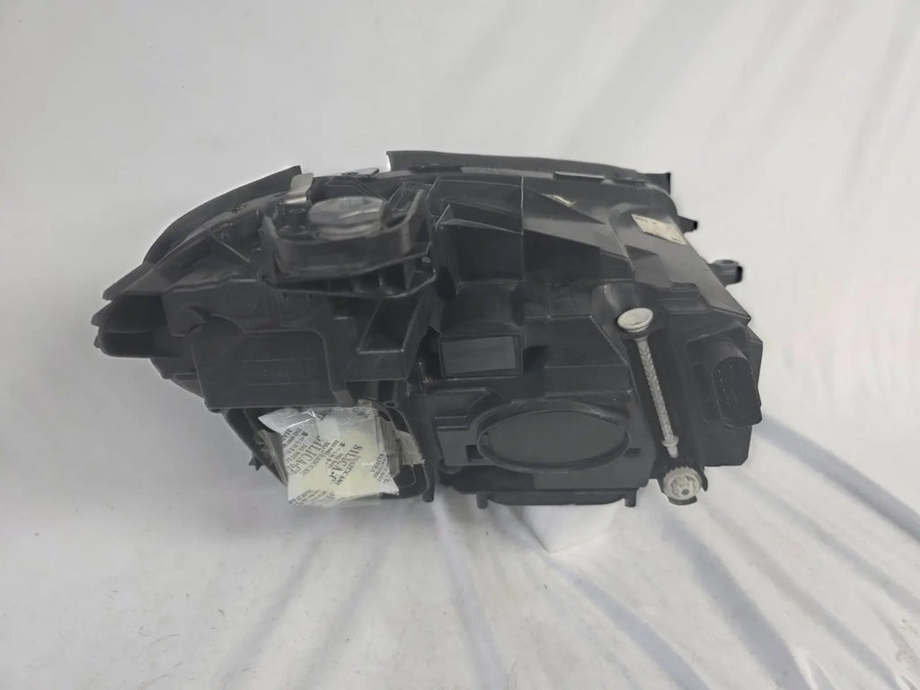 This image displays the left-side Multibeam LED headlight with blue accents for the Mercedes-Benz E-Class W213, featuring OEM genuine quality and part number A2139066504. This original used headlamp is designed for precise fitment on the W213 model, offering advanced Multibeam LED technology with distinctive blue detailing for high-performance adaptive illumination and premium styling