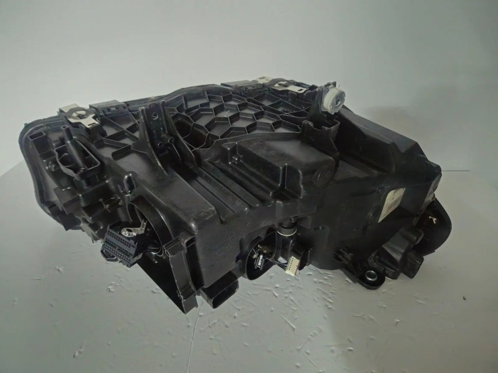 This image shows the left-side ICON Adaptive LED headlight for BMW models iX3 G08, X3 G01, X3 M F97, X4 G02, and X4 M F98, featuring OEM genuine quality with part number 7466119. This used original headlamp is designed to deliver BMW’s signature Adaptive LED lighting with ICON styling, ensuring precise fitment, enhanced visibility, and modern aesthetics for these high-performance models.