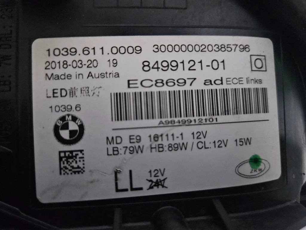 This image shows the left-side Adaptive LED ICON headlight for the BMW 5 Series G30, G31, G38, and F90 LCI models, featuring OEM genuine quality with part number 8499121. This used original headlamp is designed for the facelifted (LCI) versions of these models, offering BMW’s signature Adaptive LED ICON lighting technology for enhanced visibility, precise beam control, and a sleek, modern design.