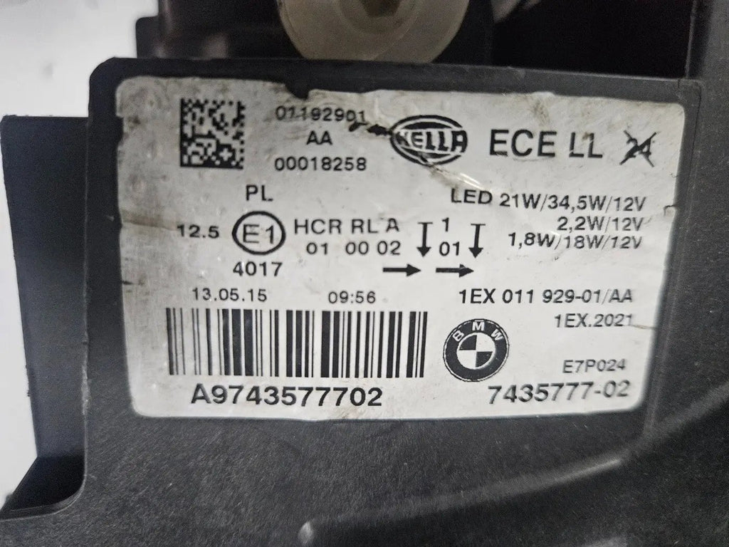 This image shows the left-side LED headlight for the BMW 1 Series F20 and F21 LCI (facelift) models, featuring OEM genuine quality with part number 7435777. This used original headlamp is specifically designed for the facelifted 1 Series, offering bright and efficient LED lighting, precise fitment, and the durability expected from authentic BMW components.