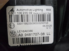 Load image into Gallery viewer, Genuine used BMW Laser headlight for 3 Series models G20 and G21. This left-side OEM headlamp, part number 9481707, features high-performance laser lighting technology for superior road visibility and driving precision. The image showcases the original left laser headlight in used condition, clearly showing the lens structure, housing, and connector ports β ideal for replacing a damaged headlamp on compatible BMW 3 Series vehicles.