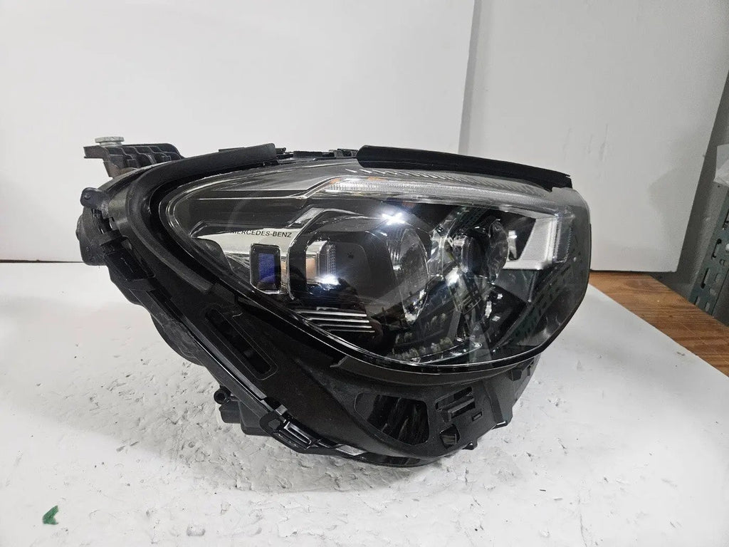 This image displays the right-side Multibeam LED headlight for the Mercedes-Benz E-Class W213 Facelift model, featuring OEM genuine quality with part number A2139066810. The headlight is an original Mercedes component, designed specifically for the facelifted W213 E-Class, offering advanced Multibeam LED lighting technology for superior road visibility and performance. This is a used but authentic part, ensuring compatibility and reliability.