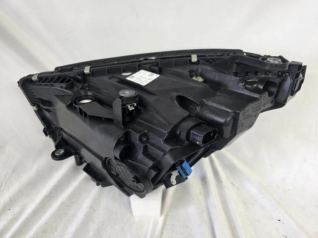 This image features the right-side DIGITAL LIGHT headlight for the Mercedes-Benz E-Class W214, with OEM genuine quality and part number A2149066202. Specifically designed for the W214 model, this used original headlamp incorporates Mercedes-Benz's advanced DIGITAL LIGHT technology, delivering adaptive high-precision illumination and a perfect factory fit on the right side.