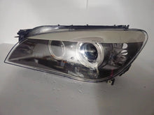 Load image into Gallery viewer, This image features the left-side Xenon headlight for the BMW 7 Series F01/F02 models, showcasing used OEM genuine quality with part number 7225229. Designed specifically for the F01 and F02 chassis, this original headlamp offers high-intensity Xenon lighting and precise fitment for the left side, ensuring reliable performance and compatibility.