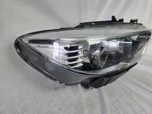 Load image into Gallery viewer, Genuine used BMW Adaptive LED headlight for 4 Series models F32, F33, F36, F80 LCI, F82, and F83. This right-side OEM headlamp, part number 7377842, is designed with adaptive lighting technology for improved visibility and performance. The image highlights the complete original headlight unit in used condition, including the clear lens, mounting points, and electrical connectors — ideal for replacement on compatible BMW models.