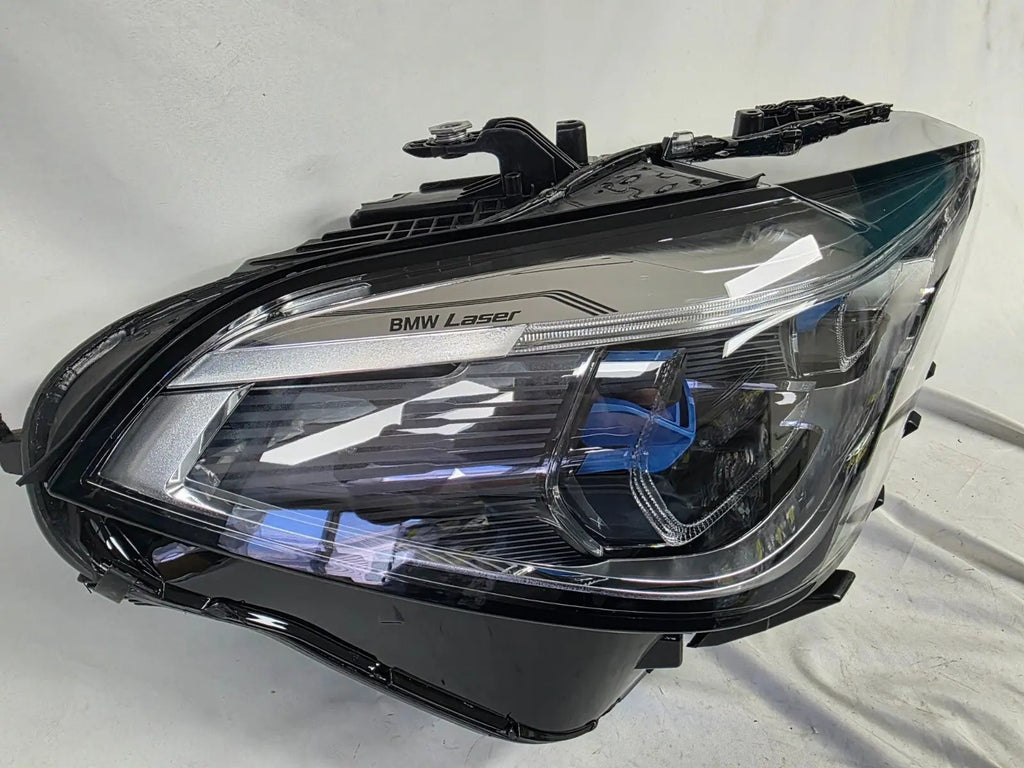 This image displays the right-side Laser headlight for BMW models X5 G05, X5 M F95, X6 G06, and X6 M F96, featuring OEM genuine quality with part number 9481790. This used original headlamp is designed for a precise factory fit and delivers advanced BMW Laserlight technology, ensuring superior illumination, modern styling, and high-performance visibility for these premium SUV models.