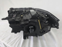 Load image into Gallery viewer, Used genuine BMW Adaptive LED headlight for X1 F48 LCI (facelift) model. This right-side OEM headlamp, part number 5A01178, is equipped with adaptive lighting technology for improved night visibility and cornering performance. The image displays the original right Adaptive LED headlight in used condition, showing the clear lens, mounting brackets, and electrical connectors — an ideal OEM replacement for BMW X1 F48 LCI vehicles.