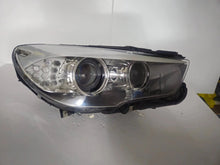 Load image into Gallery viewer, This image shows the right-side Bi-Xenon headlight for the BMW 5 Series GT F07 model, featuring OEM genuine quality with part number 7262720. It is a used original headlight designed for precise fit on the right side of the BMW F07 Gran Turismo, offering advanced Bi-Xenon lighting performance and durable OEM construction