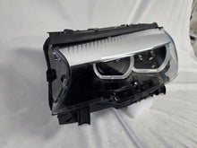 Load image into Gallery viewer, This image shows the left-side LED headlight for the BMW 5 Series G30 and G31 models, featuring OEM genuine quality with part number 7439199. This used original headlamp is engineered for a precise fit on the left side, offering bright and efficient LED illumination, modern styling, and the reliable performance expected from BMW components.
