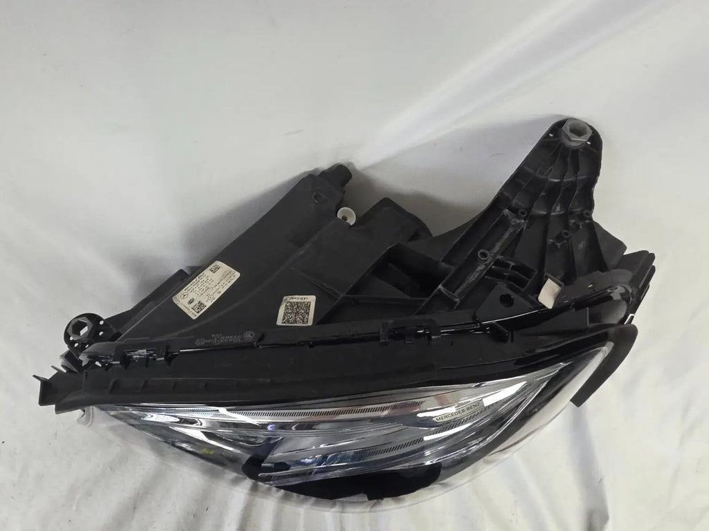 This image displays the left-side Multibeam LED headlight with blue accents for the Mercedes-Benz E-Class W213, featuring OEM genuine quality and part number A2139066504. This original used headlamp is designed for precise fitment on the W213 model, offering advanced Multibeam LED technology with distinctive blue detailing for high-performance adaptive illumination and premium styling